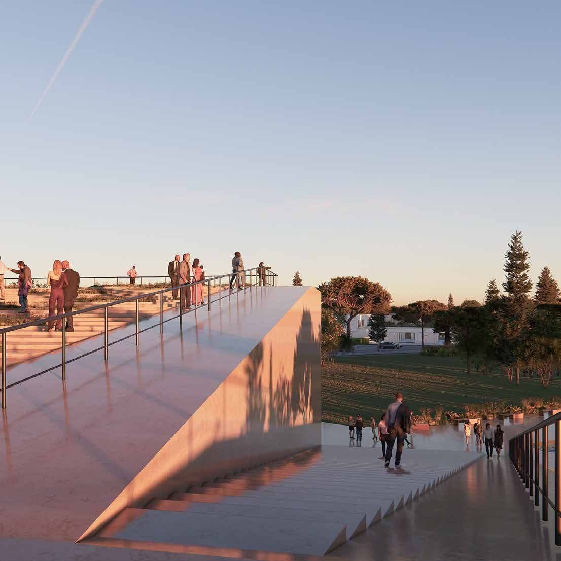 Visitors on the rooftop steps of the Cultural Center at sunset